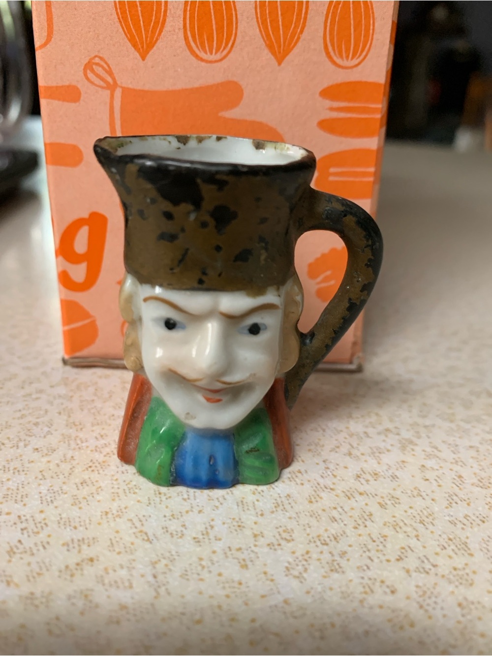 Hand-Painted Ceramic Character Pitcher in Brown, Green, Blue